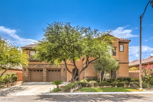 409 Lake Windemere St, Las Vegas, NV 89138 - view of front of house featuring a garage, stucco siding, and driveway