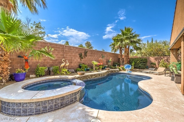 409 Lake Windemere St, Las Vegas, NV 89138 - view of swimming pool featuring a pool with connected hot tub, a patio, and a fenced backyard