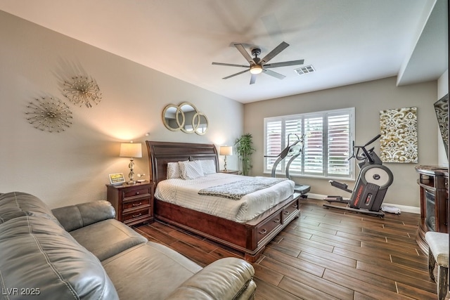 409 Lake Windemere St, Las Vegas, NV 89138 - bedroom with visible vents, baseboards, wood tiled floor, and ceiling fan
