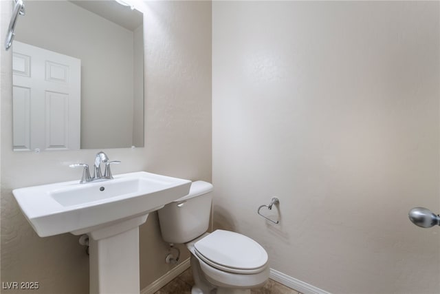 6412 Dimatteo St, Las Vegas, NV 89148 - half bathroom featuring toilet and baseboards