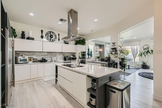 10408 Mezzanino Ct, Las Vegas, NV 89135 - kitchen featuring open shelves, stainless steel appliances, island range hood, and modern cabinets