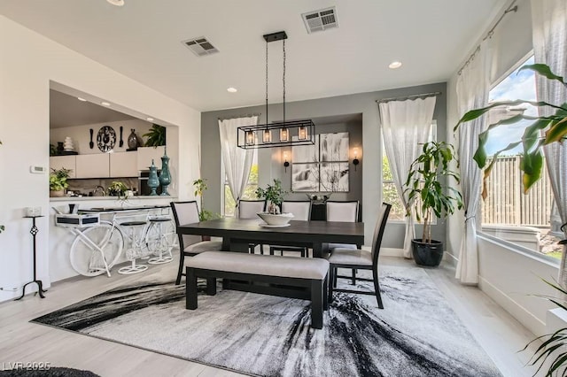 10408 Mezzanino Ct, Las Vegas, NV 89135 - dining space with light wood-type flooring, visible vents, and recessed lighting