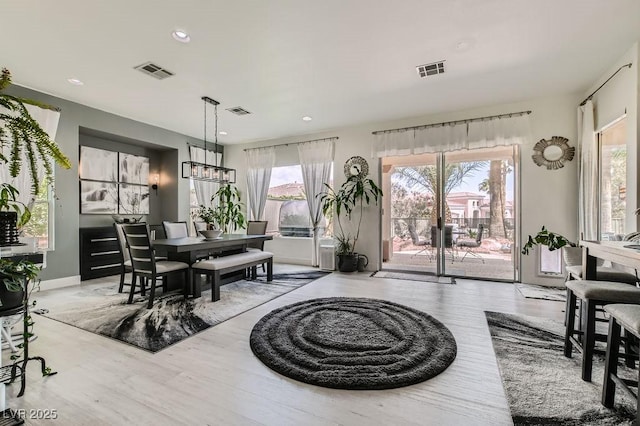 10408 Mezzanino Ct, Las Vegas, NV 89135 - interior space with plenty of natural light, light wood-style floors, and visible vents