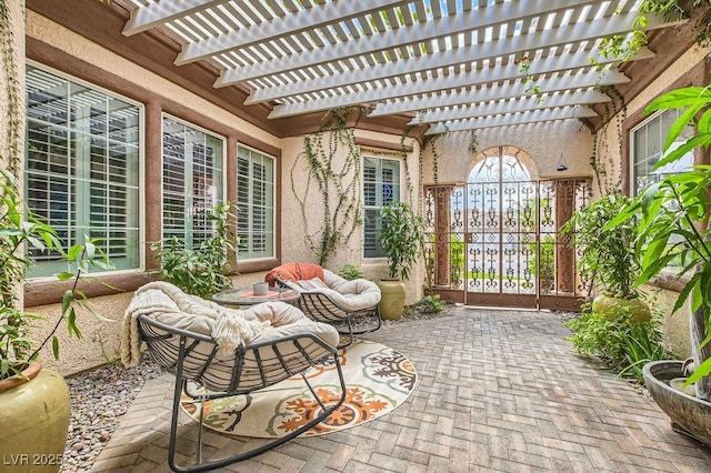 10408 Mezzanino Ct, Las Vegas, NV 89135 - view of patio with outdoor lounge area, a gate, and a pergola