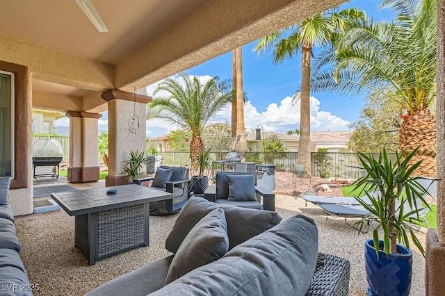 10408 Mezzanino Ct, Las Vegas, NV 89135 - view of patio / terrace with a fenced backyard and outdoor lounge area