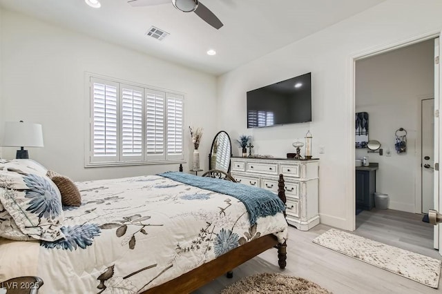10408 Mezzanino Ct, Las Vegas, NV 89135 - bedroom featuring baseboards, light wood finished floors, ceiling fan, visible vents, and connected bathroom