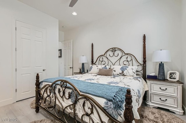 10408 Mezzanino Ct, Las Vegas, NV 89135 - bedroom with light wood-type flooring, a ceiling fan, and recessed lighting