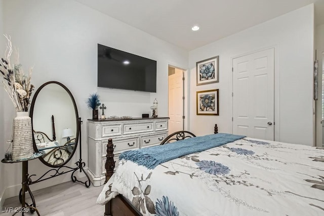 10408 Mezzanino Ct, Las Vegas, NV 89135 - bedroom featuring light wood-style flooring, baseboards, and recessed lighting