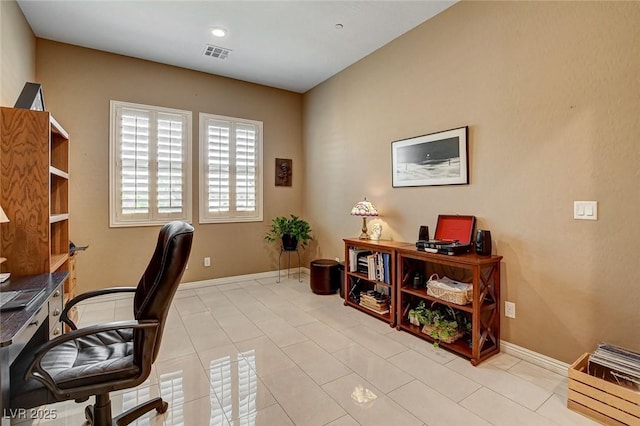 2425 Amatrice St, Henderson, NV 89044 - office area with light tile patterned floors, visible vents, and baseboards