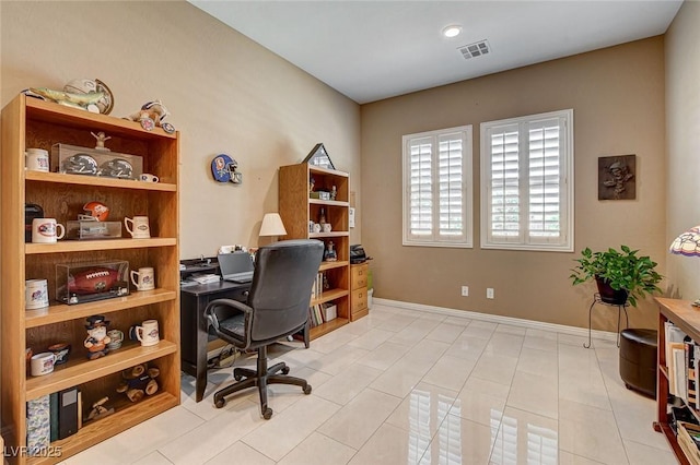 2425 Amatrice St, Henderson, NV 89044 - home office with baseboards, light tile patterned floors, and visible vents