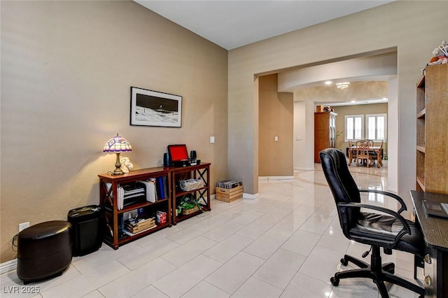 2425 Amatrice St, Henderson, NV 89044 - office area with light tile patterned floors and baseboards