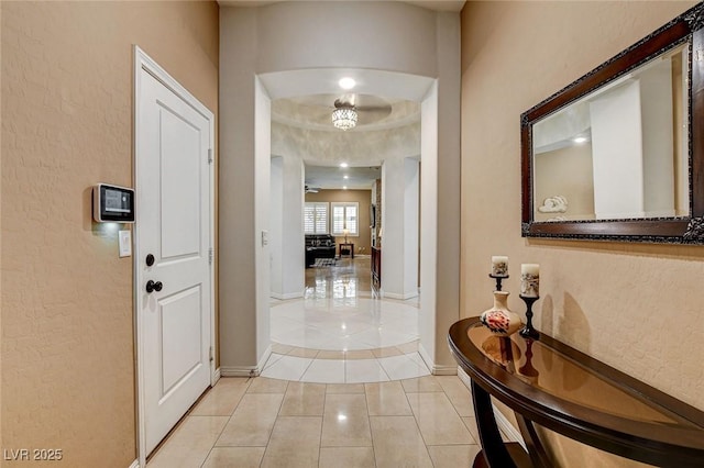 2425 Amatrice St, Henderson, NV 89044 - corridor featuring baseboards and light tile patterned floors