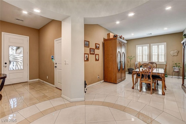 2425 Amatrice St, Henderson, NV 89044 - foyer entrance featuring light tile patterned floors, visible vents, baseboards, and recessed lighting