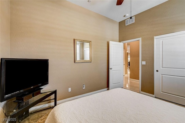 2425 Amatrice St, Henderson, NV 89044 - tiled bedroom featuring visible vents, baseboards, and ceiling fan