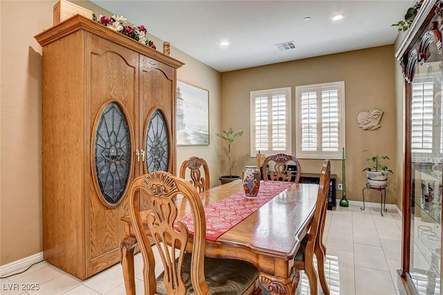 2425 Amatrice St, Henderson, NV 89044 - dining area featuring light tile patterned flooring, a wealth of natural light, baseboards, and visible vents