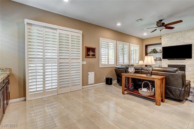 2425 Amatrice St, Henderson, NV 89044 - living area featuring visible vents, baseboards, a ceiling fan, and recessed lighting