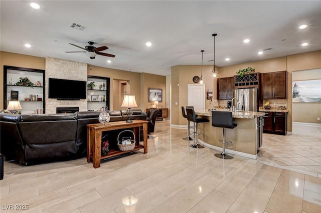 2425 Amatrice St, Henderson, NV 89044 - living area featuring a ceiling fan, recessed lighting, and visible vents