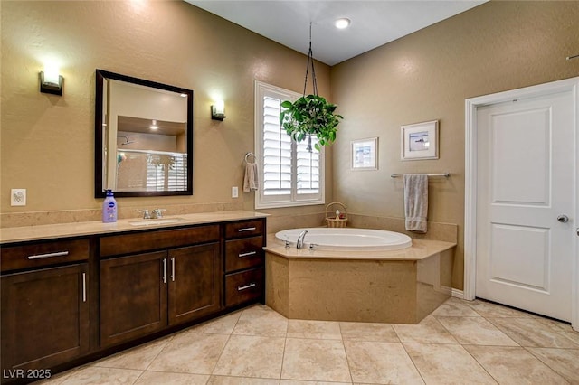 2425 Amatrice St, Henderson, NV 89044 - full bathroom featuring vanity, a garden tub, and tile patterned floors