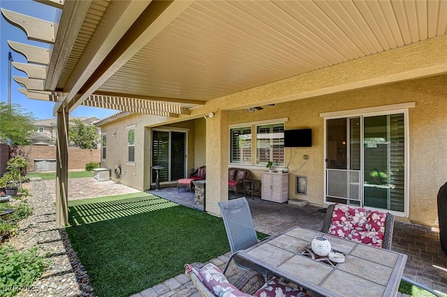 2425 Amatrice St, Henderson, NV 89044 - view of patio / terrace featuring fence and outdoor dining area