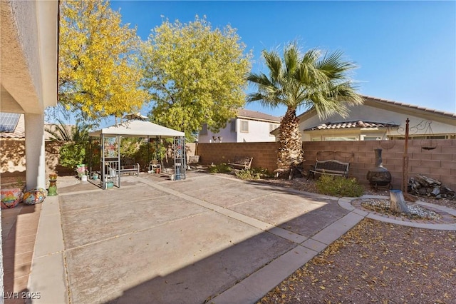 11132 Ferragamo Ct, Las Vegas, NV 89141 - view of patio with a fenced backyard and a gazebo