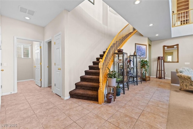 11132 Ferragamo Ct, Las Vegas, NV 89141 - stairway with baseboards, recessed lighting, tile patterned flooring, and visible vents