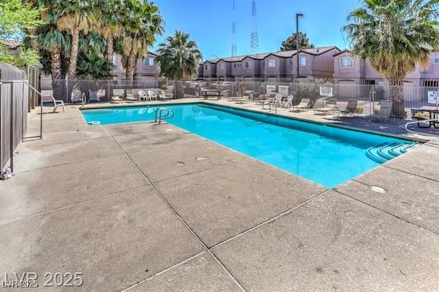 2524 Charleville Ave Unit 102, Las Vegas, NV 89106 - pool featuring a patio area, a residential view, and fence