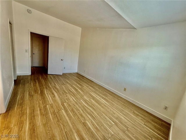 2524 Charleville Ave Unit 102, Las Vegas, NV 89106 - unfurnished room with light wood-style flooring and baseboards