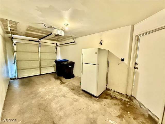 2524 Charleville Ave Unit 102, Las Vegas, NV 89106 - garage with freestanding refrigerator and a garage door opener