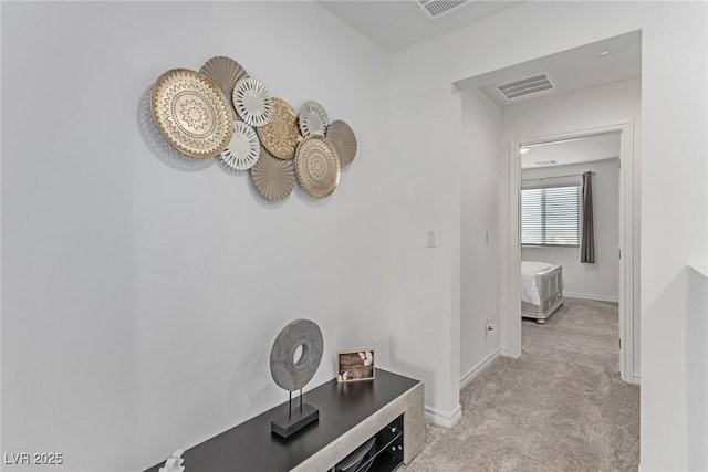 6150 Foxes Dale St, Las Vegas, NV 89166 - hallway with light carpet and baseboards