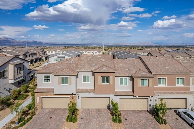 aerial view with a residential view and a mountain view