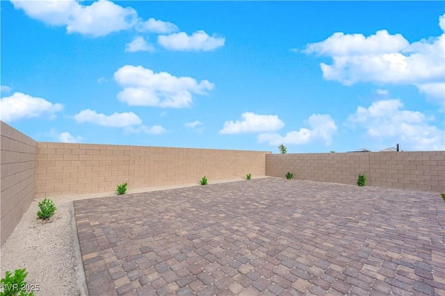 view of patio featuring a fenced backyard