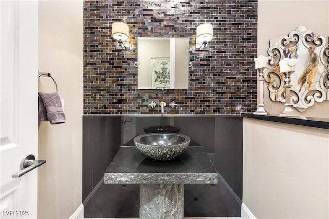 9500 Balatta Canyon Ct, Las Vegas, NV 89144 - bathroom featuring backsplash and a sink