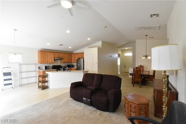 living area featuring a ceiling fan, visible vents, lofted ceiling, and recessed lighting