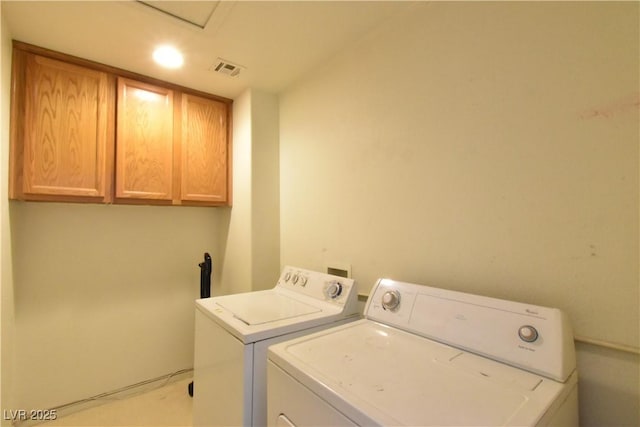 laundry room featuring cabinet space, visible vents, washer and dryer, and recessed lighting