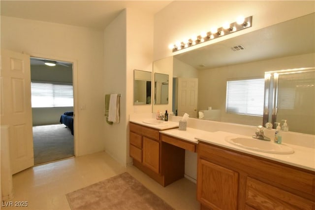 full bath featuring plenty of natural light, visible vents, and a sink