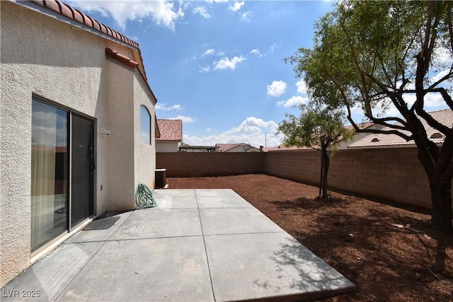 view of patio with a fenced backyard