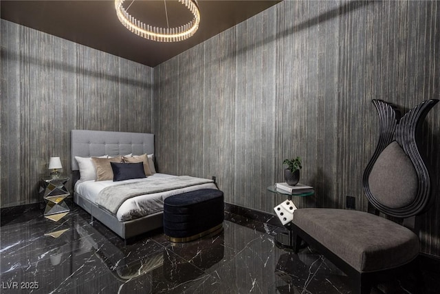 bedroom featuring baseboards and marble finish floor