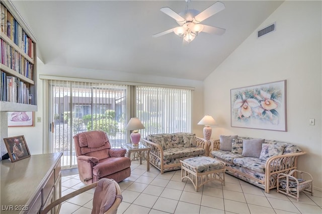 living room with light tile patterned floors, visible vents, a ceiling fan, and high vaulted ceiling