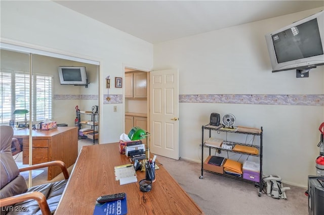 view of carpeted office space