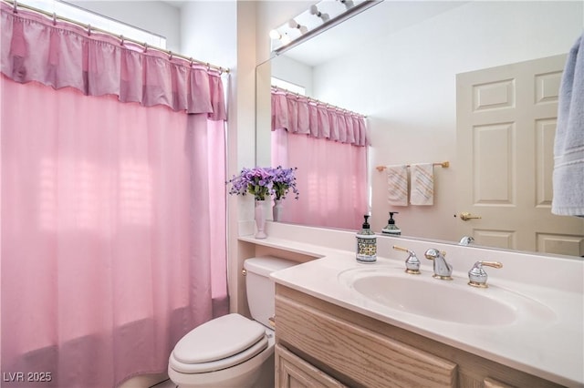 full bathroom with vanity, toilet, and shower / bathtub combination with curtain