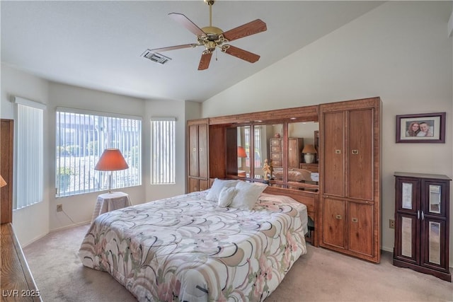 bedroom with light carpet, baseboards, high vaulted ceiling, and visible vents