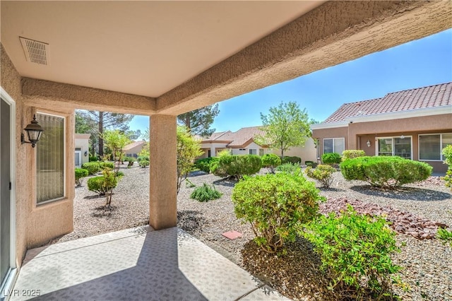 view of patio with visible vents