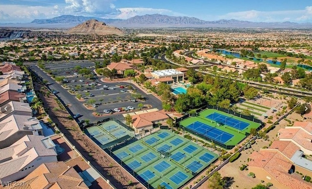 birds eye view of property featuring a residential view and a water and mountain view