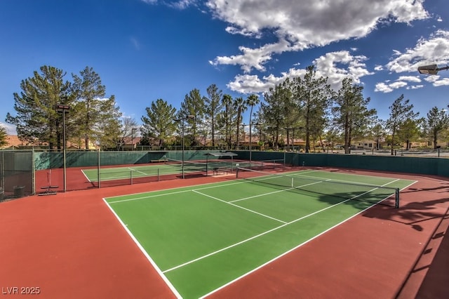 view of sport court with community basketball court and fence