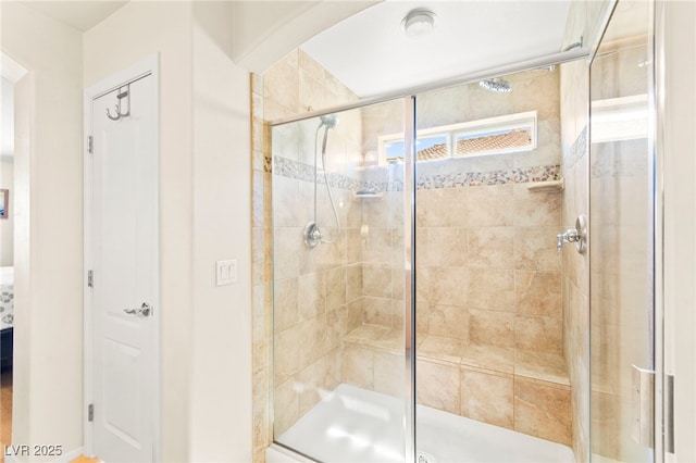 full bathroom featuring a shower stall
