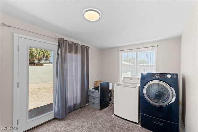 washroom with laundry area, washing machine and dryer, and carpet