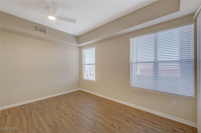 50 E Serene Ave Unit 420, Las Vegas, NV 89123 - spare room featuring wood finished floors, baseboards, and ceiling fan