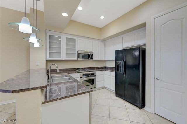 50 E Serene Ave Unit 420, Las Vegas, NV 89123 - kitchen with appliances with stainless steel finishes, a peninsula, a sink, glass insert cabinets, and light tile patterned flooring