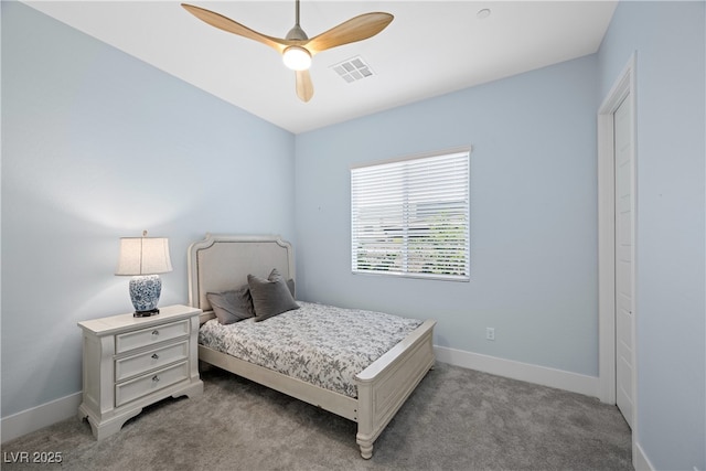 bedroom with carpet, visible vents, baseboards, and ceiling fan