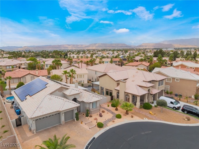 bird's eye view featuring a mountain view and a residential view